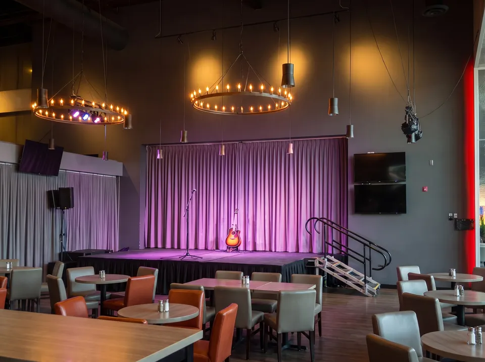 The Well pub with its stage and ring chandeliers